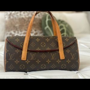 This beautiful authentic top-handle Louis Monogram bag is everything!